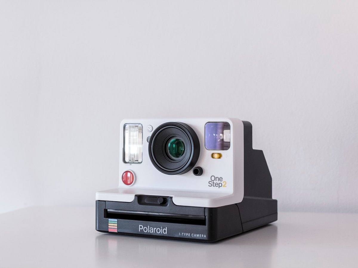 Polaroid camera on a white table